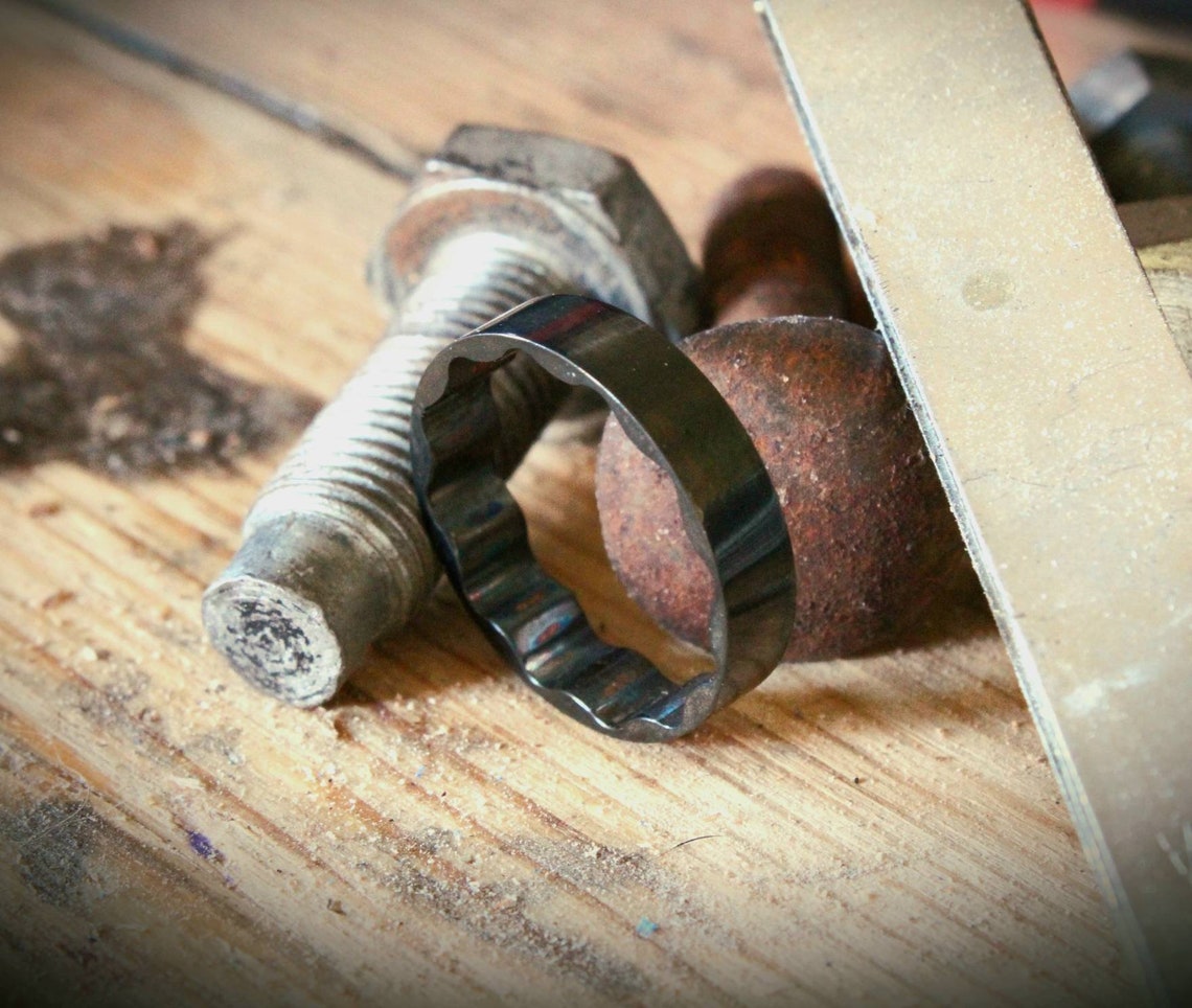 Black Socket Ring made from a 19mm mechanics socket, featuring ridged interior for comfort, black finish, and crafted from durable high-grade tool steel for a bold industrial look