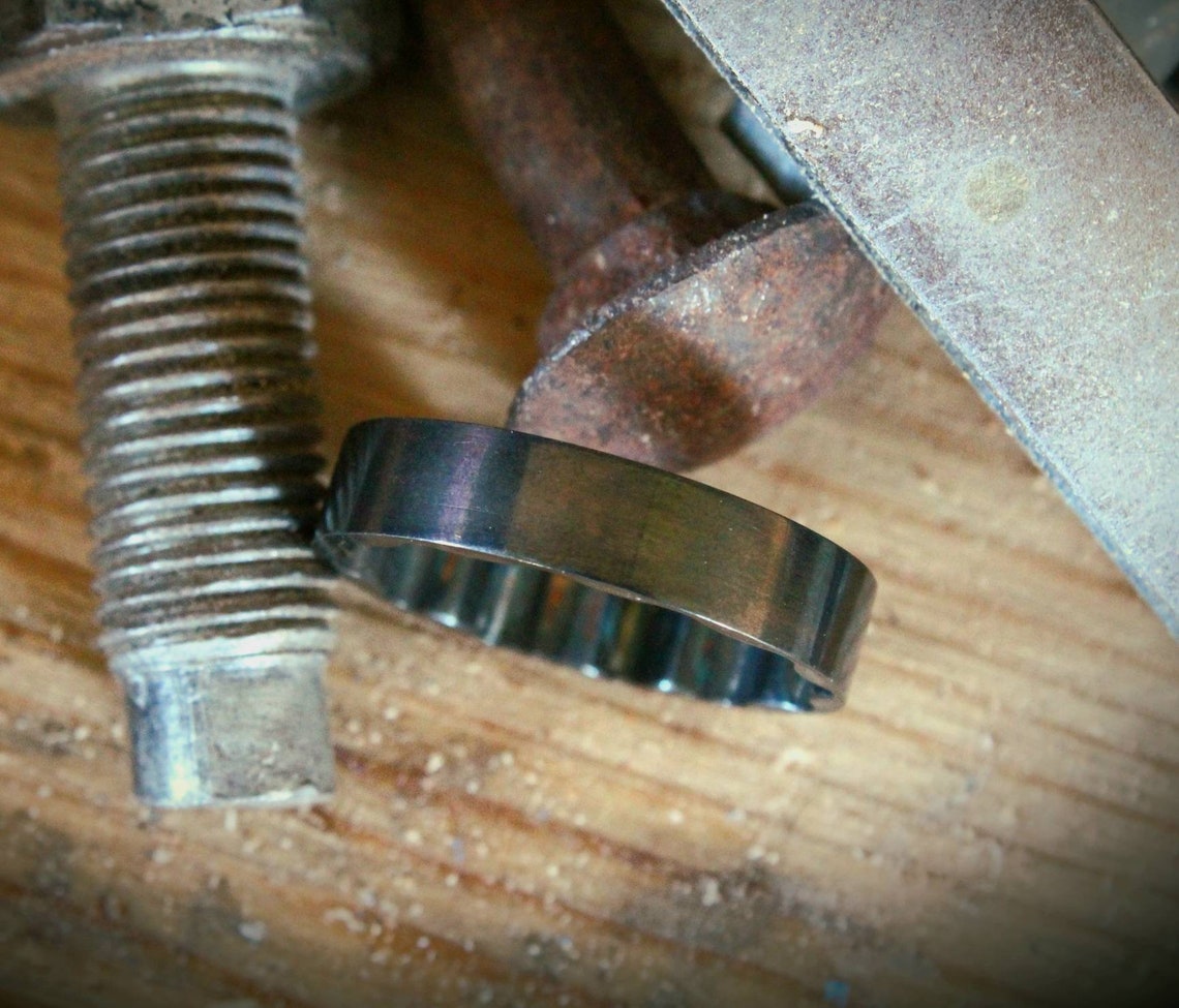 Black Socket Ring made from a 19mm mechanics socket, featuring ridged interior for comfort, black finish, and crafted from durable high-grade tool steel for a bold industrial look