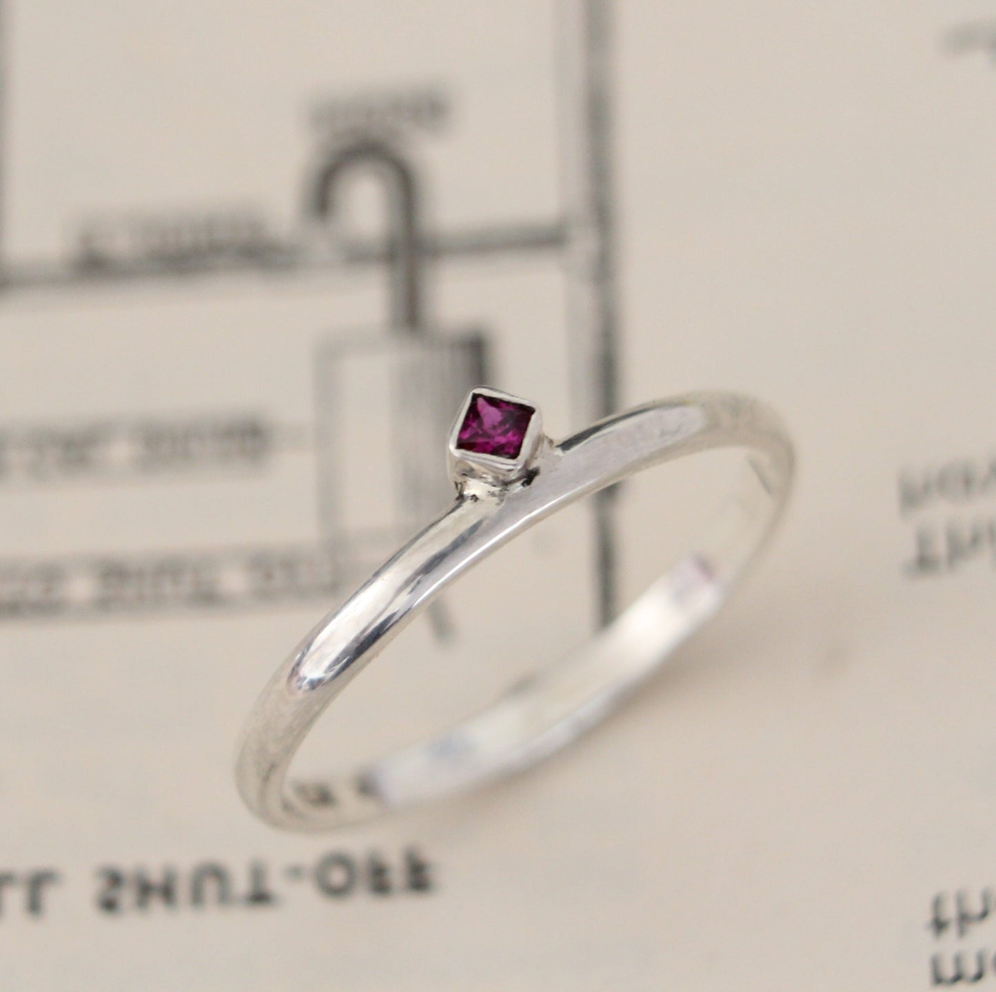 Princess cut Ruby and Sterling Silver Ring