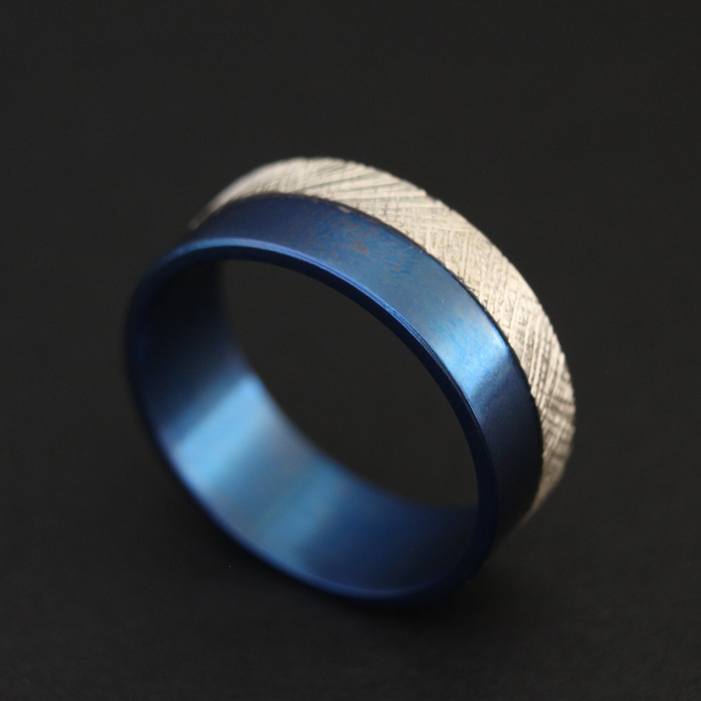 Titanium ring with sterling silver