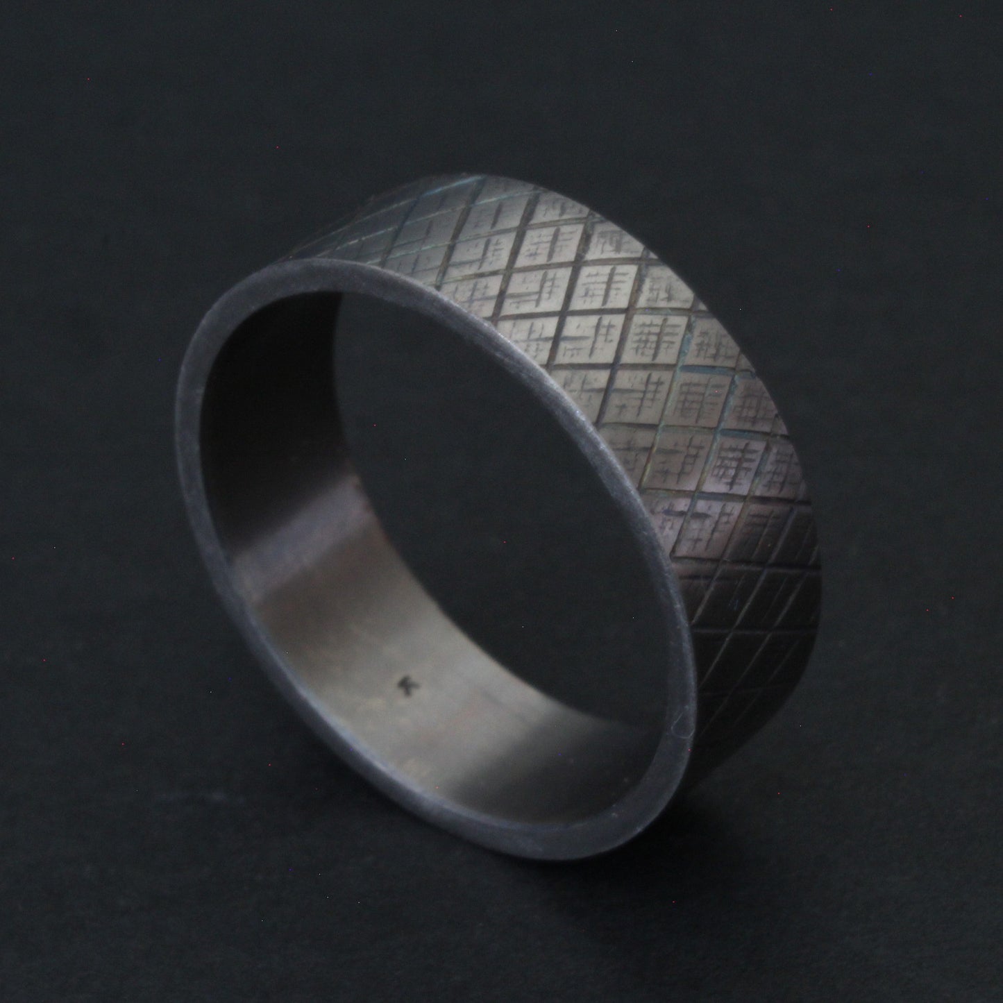 Titanium knurled ring heat treated