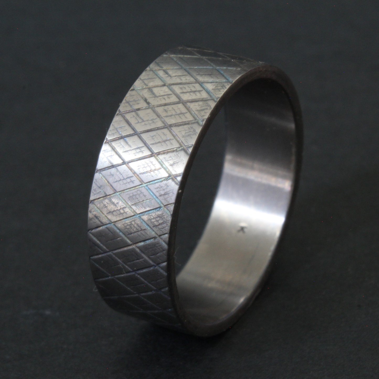 Titanium knurled ring heat treated