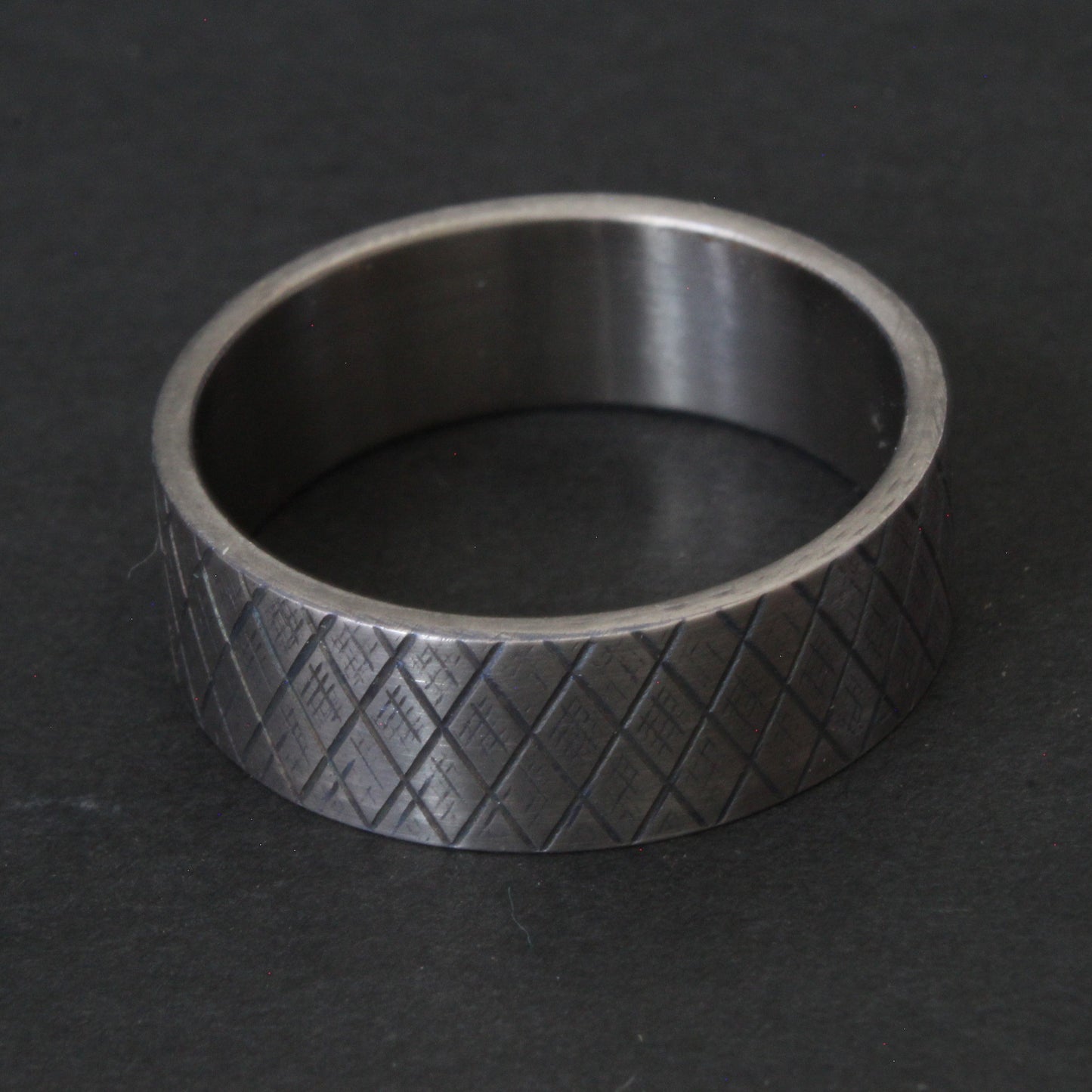 Titanium knurled ring heat treated