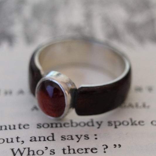 Akley Jewellers Garnet in sterling silver bezel setting and Australian Gidgee hardwood ring