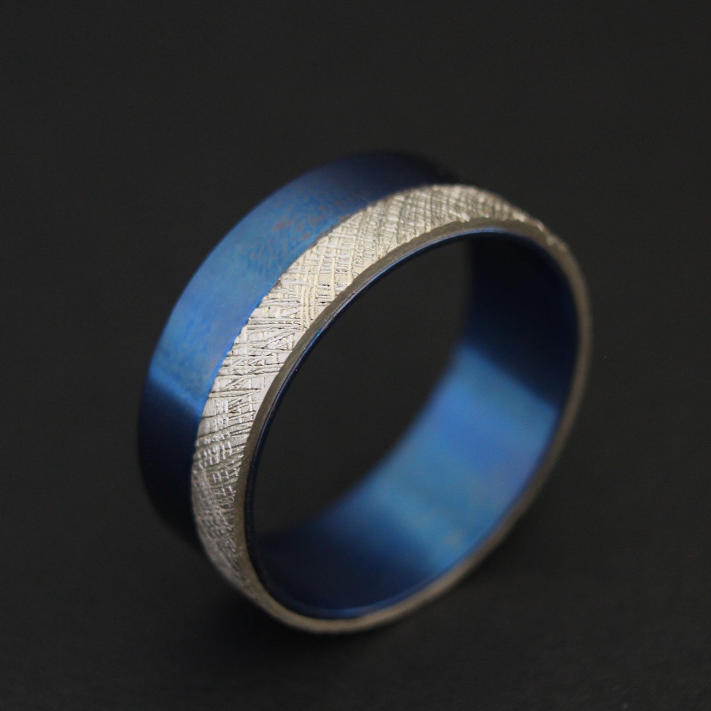 Titanium ring with sterling silver